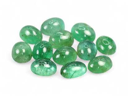 3.86 Carats Green Emerald Cabochon Lot - Natural Zambian Stones: This appealing lot of Zambian emerald cabochons glows with a fresh, medium green hue, accented by natural internal features that give each stone unique character. The domed cabochon cuts enhance the g