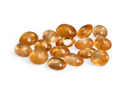6.34 Carats Fanta Mandarin Garnet Cabochon Lot - Natural Stones: This bright and lively lot of mandarin garnet cabochons radiates a warm, golden-orange hue, reminiscent of sunlit amber. Each gem features a smooth, polished dome that enhances its translucence, allow