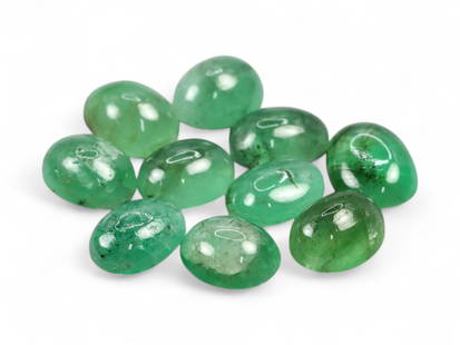 3.45 Carats Green Emerald Cabochon Lot - Natural Zambian Stones: This appealing lot of Zambian emerald cabochons glows with a fresh, medium green hue, accented by natural internal features that give each stone unique character. The domed cabochon cuts enhance the g