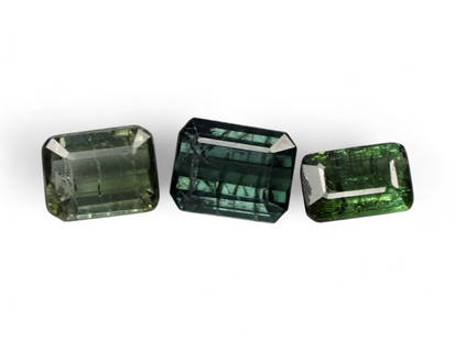 5.00 Carats Deep Forest Green Tourmaline Lot - Natural Nigerian Stones: This refined lot of green tourmalines displays a rich, forest-green hue with subtle variations that catch the light and reveal flashes of lighter green from within. Cut in classic emerald step cuts, t