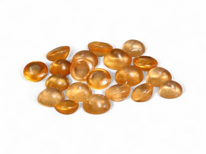 6.56 Carats Fanta Mandarin Garnet Cabochon Lot - Natural Stones: This bright and lively lot of mandarin garnet cabochons radiates a warm, golden-orange hue, reminiscent of sunlit amber. Each gem features a smooth, polished dome that enhances its translucence, allow