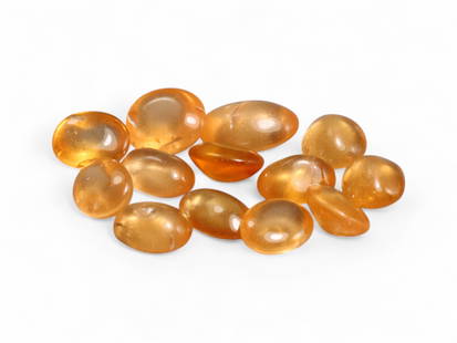 6.14 Carats Fanta Mandarin Garnet Cabochon Lot - Natural Stones: This bright and lively lot of mandarin garnet cabochons radiates a warm, golden-orange hue, reminiscent of sunlit amber. Each gem features a smooth, polished dome that enhances its translucence, allow