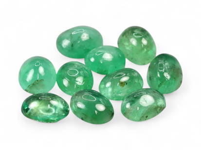 3.00 Carats Green Emerald Cabochon Lot - Natural Zambian Stones: This appealing lot of Zambian emerald cabochons glows with a fresh, medium green hue, accented by natural internal features that give each stone unique character. The domed cabochon cuts enhance the g