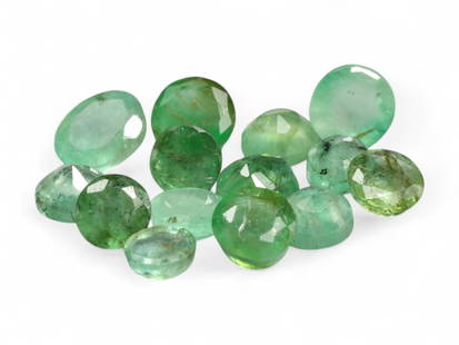 4.12 Carats Green Emerald Round Lot - Natural Zambian Stones: This parcel of round-cut Zambian emeralds displays a harmonious mix of medium to deep green tones, some with the bluish undertone for which the region is renowned. The gems feature a lively translucen