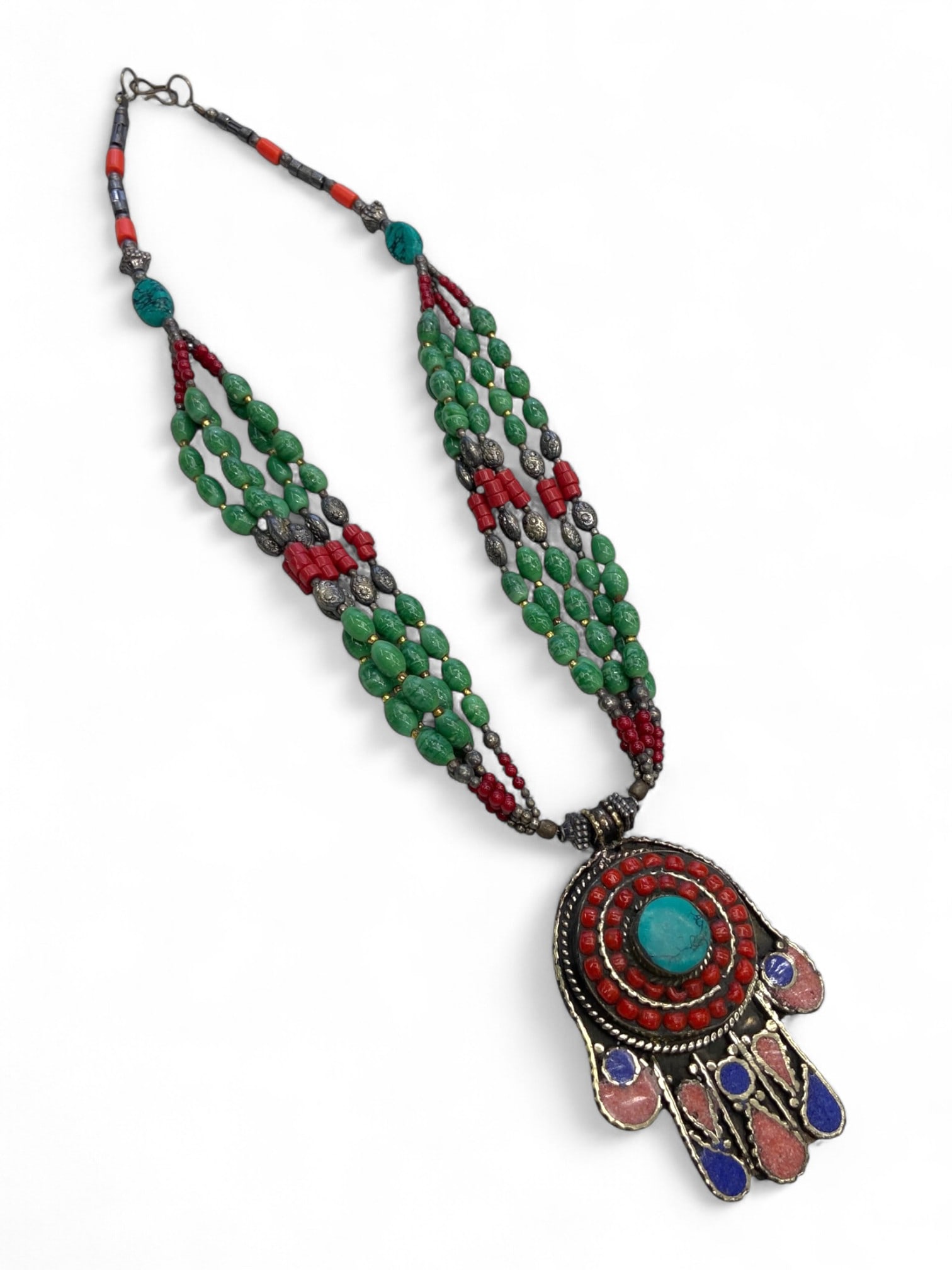 Vintage Himalayan Tribal Hamsa Hand Turquoise Coral Lapis Pendant Necklace, mid-20th Century, 126g: This vibrant vintage Himalayan necklace, likely crafted in Nepal or Tibet during the mid-20th century, showcases a powerful fusion of symbolism, color, and artisanal skill. At its center hangs a large