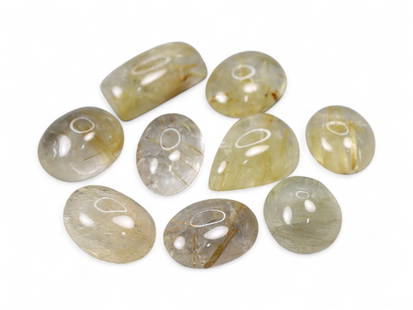29.01 Carats Golden Needle Rutile Quartz Lot - Natural Cabochon Stones: This captivating lot of rutile quartz features golden needle-like inclusions suspended within transparent to translucent quartz bodies, creating a visual effect that feels both organic and luminous. E