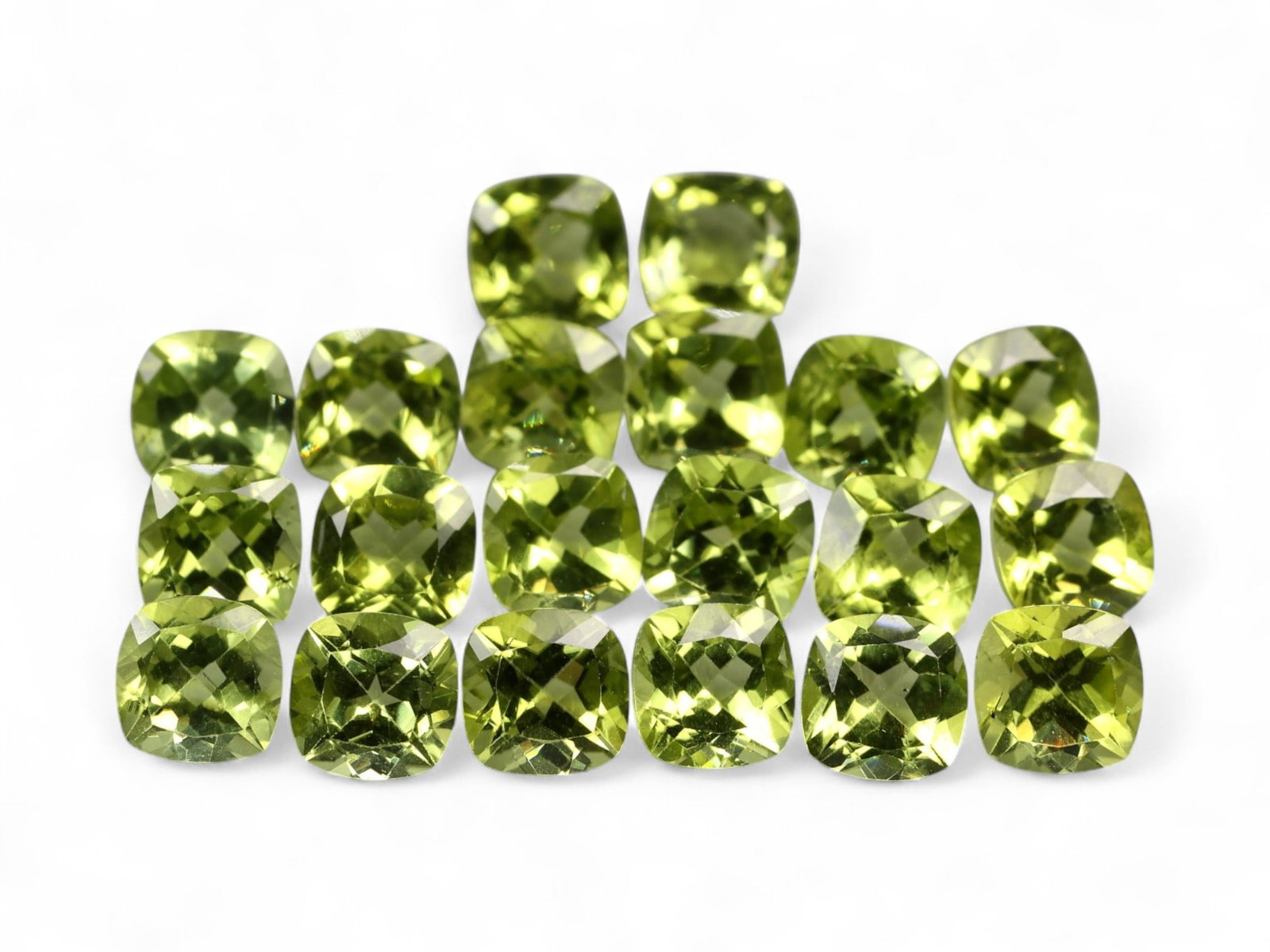 13.43 Carats Vivid Green Peridot Parcel - Natural Cushion-Cut Stones: This bright and lively parcel of natural peridots boasts a vibrant yellowish-green hue, each stone cut in a well-proportioned cushion style to maximize brilliance and sparkle. The crisp faceting enhan
