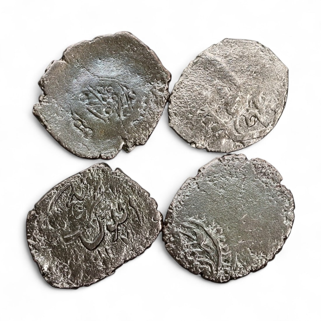 Ancient Medieval Islamic Caliphate Silver Coin Collection, c. 12th-14th Century CE, 15g: This quartet of medieval silver coins carries the legacy of the Islamic Caliphates during a period of significant cultural, political, and economic influence between the 12th and 14th centuries CE. Th
