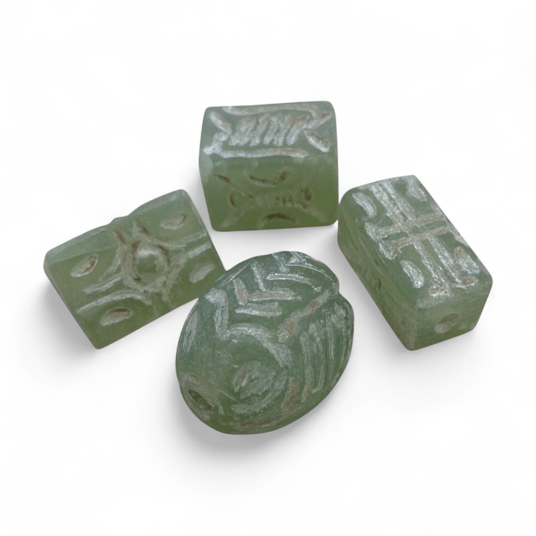 Ancient Coptic Egyptian Engraved Green Stone Beads, 4pcs, c. 4th-7th Century CE, 38g: This striking set of four Coptic Egyptian beads, carved from a soft green stone resembling jasper or serpentine, dates to the early Christian period of Egypt between the 4th and 7th centuries CE. Each