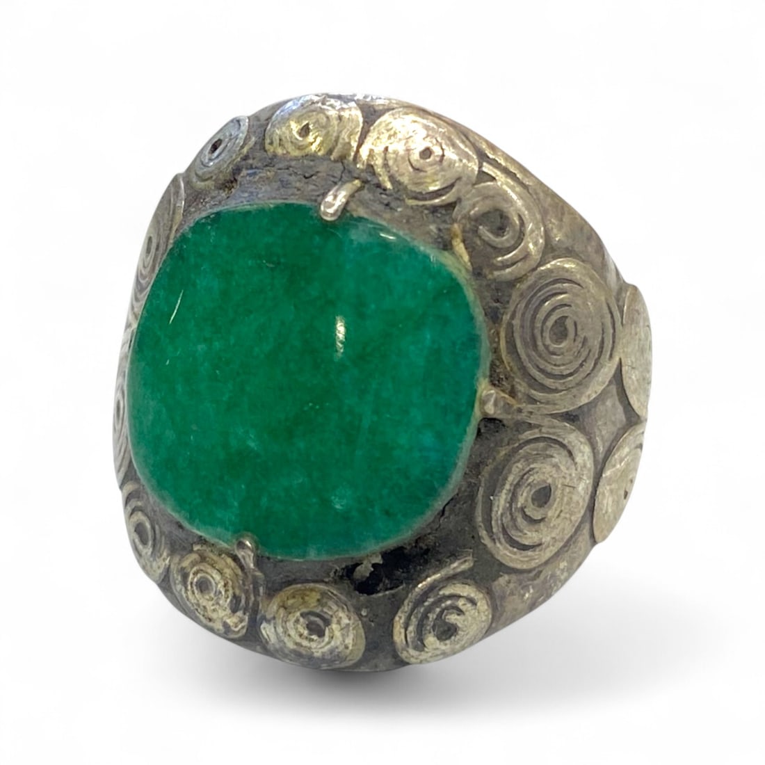 Antique Central Asian Swirl Motif Silver Ring with Green Cabochon, early 20th Century, 13g: Radiating both mystique and power, this antique silver ring from Central Asia or northern India showcases an ornate swirl motif surrounding a vivid green cabochon stone. Likely crafted in the early 20