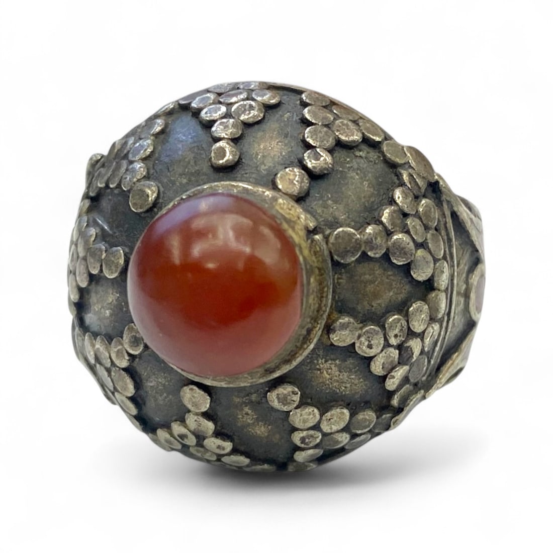 Antique Berber High-Dome Silver Ring, Red Glass Cabochon & Granulation, c. 19th Century, 8g: This impressive antique silver ring, likely of North African Berber origin from the 19th century, is a stunning example of traditional tribal adornment. Its elevated dome form-accented with dense gran