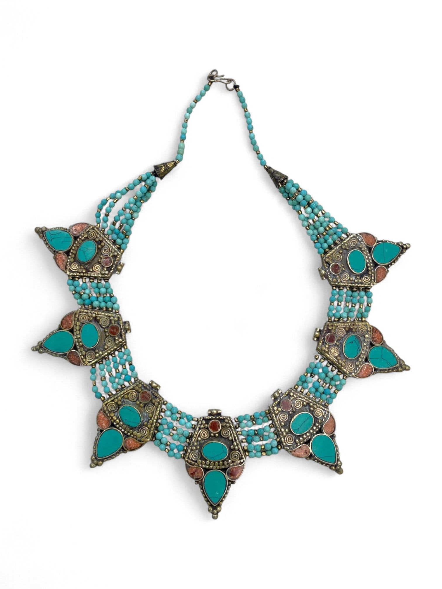 Vintage Himalayan Tribal Turquoise Coral Silver Panel Necklace, mid-20th Century, 123g: This elaborate vintage Himalayan necklace, likely originating from Nepal or Tibet in the mid-20th century, is a striking display of traditional tribal artistry. Comprising seven ornate silver-tone pan