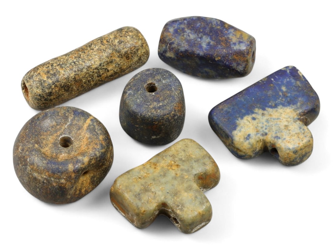Ancient Bactrian Abstract Lapis Lazuli Beads and Spacers Collection, 3rd-2nd Millennium BCE, 33.8g: This sculptural group of six lapis lazuli beads and spacer forms hails from the ancient Bactrian region, a cultural crossroads of the Bronze Age flourishing in present-day northern Afghanistan. Dating