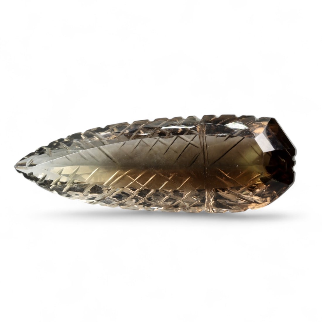 111.55 Carats Carved Smoky Quartz Spear - Natural Brazilian Stone: This impressive 111.55 carat smoky quartz has been expertly carved into an elongated spear shape, showcasing a smoky gradient that transitions from rich bronze to pale champagne. Its surface features