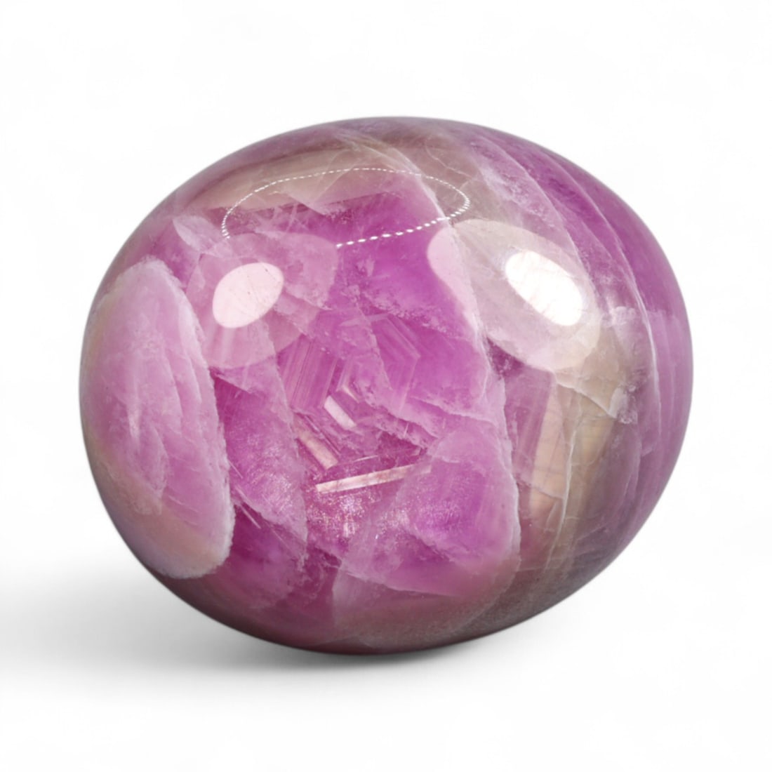 20.18 Carats Deep Marbled Ruby Cabochon - Natural African Origin: With swirling crimson and pink tones layered beneath a polished cabochon dome, this ruby offers a striking display of natural texture and inner movement. The gem's painterly inclusions create a dynami