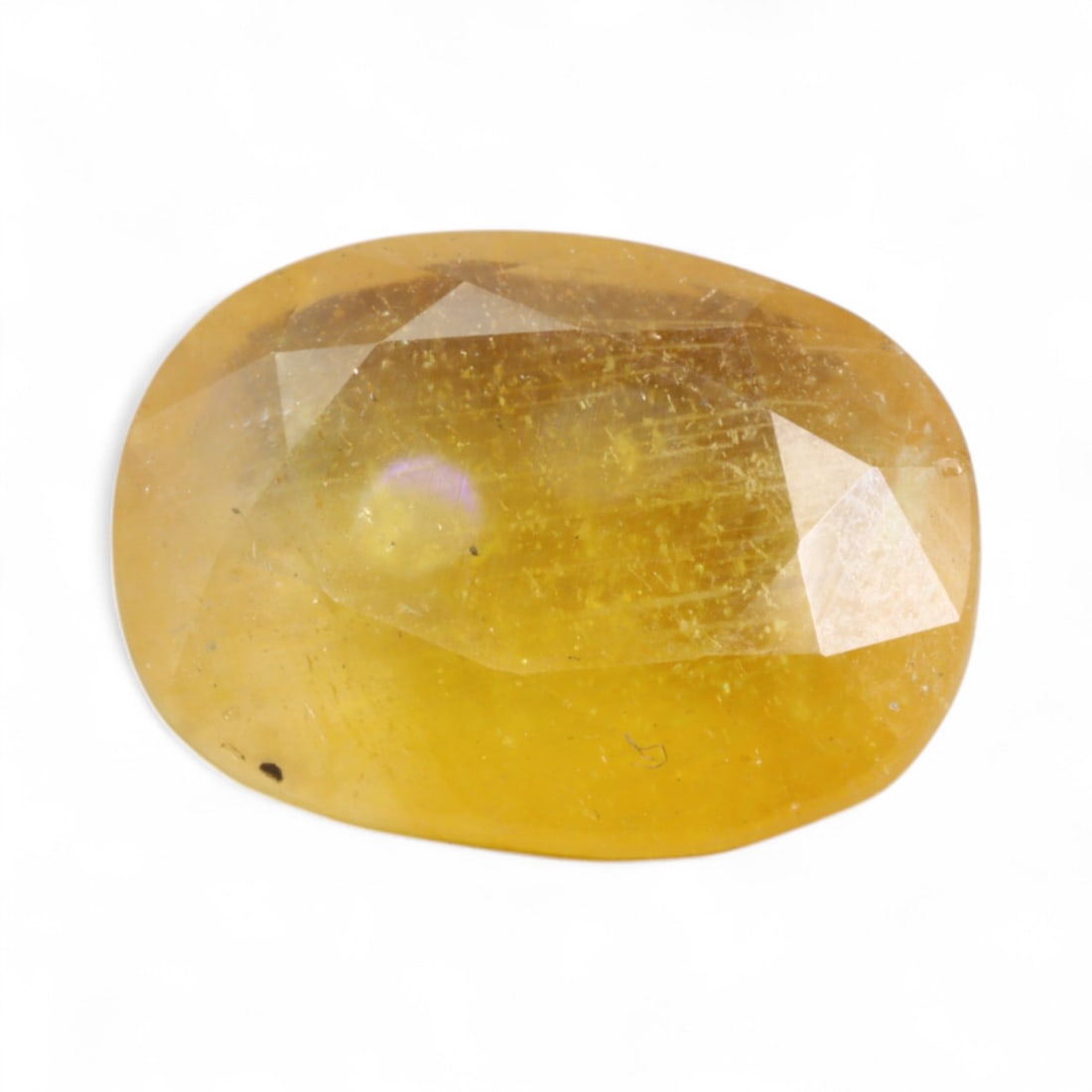 11.06 Carats Earthy Golden Yellow Sapphire - Natural African Stone: This substantial yellow sapphire displays a warm, earthy golden tone with a softly diffused inner glow. Its surface reveals natural inclusions and internal textures that lend a raw, organic character,