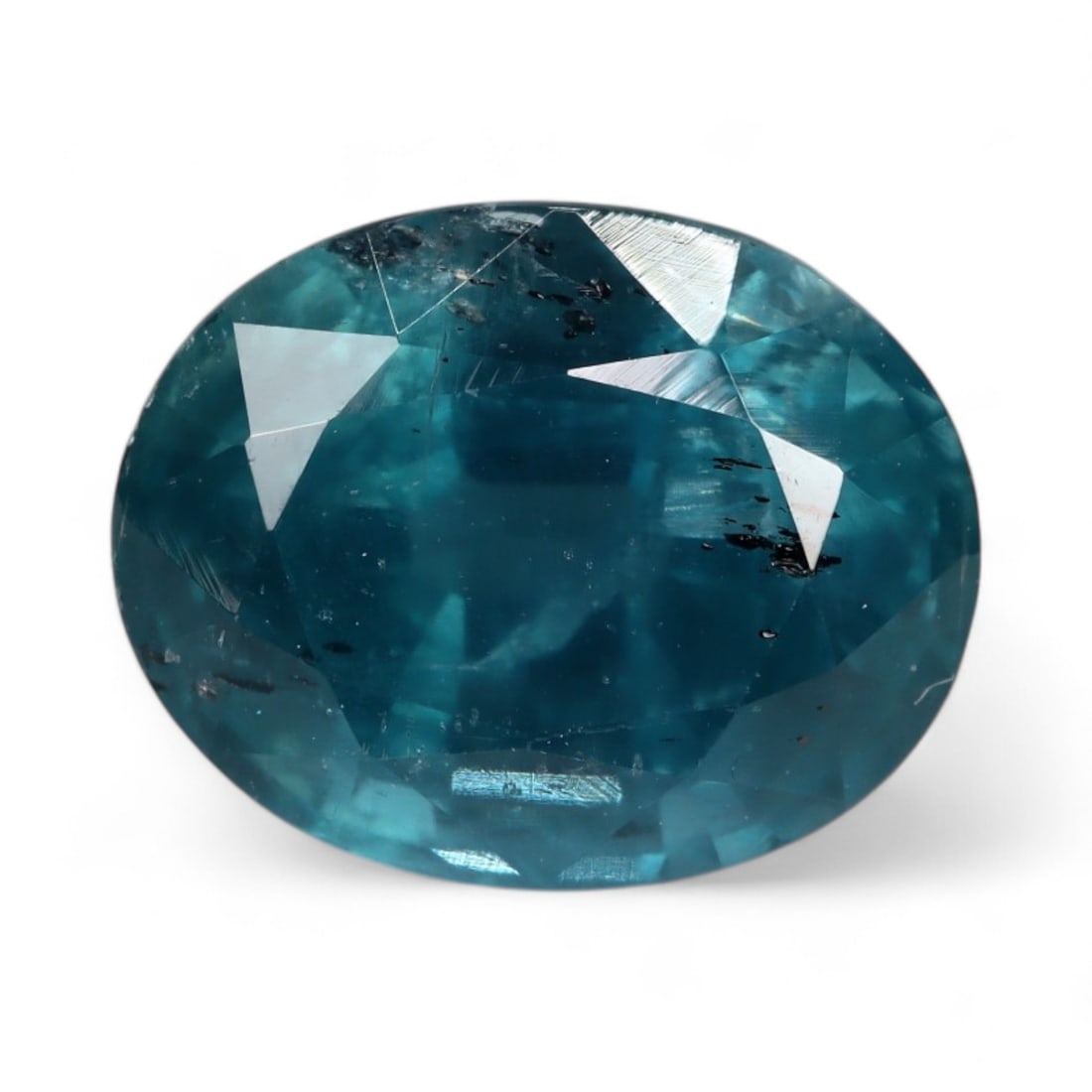 6.07 Carats Deep Teal Blue Kyanite - Natural Loose Gemstone: This striking kyanite showcases a saturated teal-blue hue with inky undertones that give it an alluring depth. The gem's elongated faceting highlights its strong pleochroism, revealing subtle shifts b