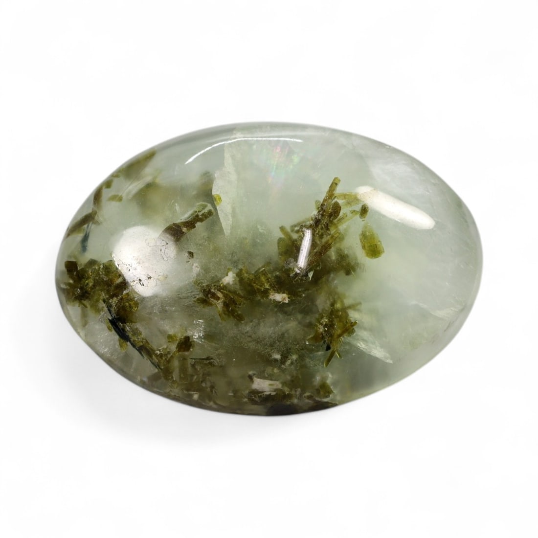 36.17 Carats Green Prehnite with Rutile Inclusions - Natural Loose Gemstone: This impressive prehnite cabochon displays a soft, misty green body, beautifully accented with fine black rutile inclusions suspended throughout the stone. The contrast between the serene green transl