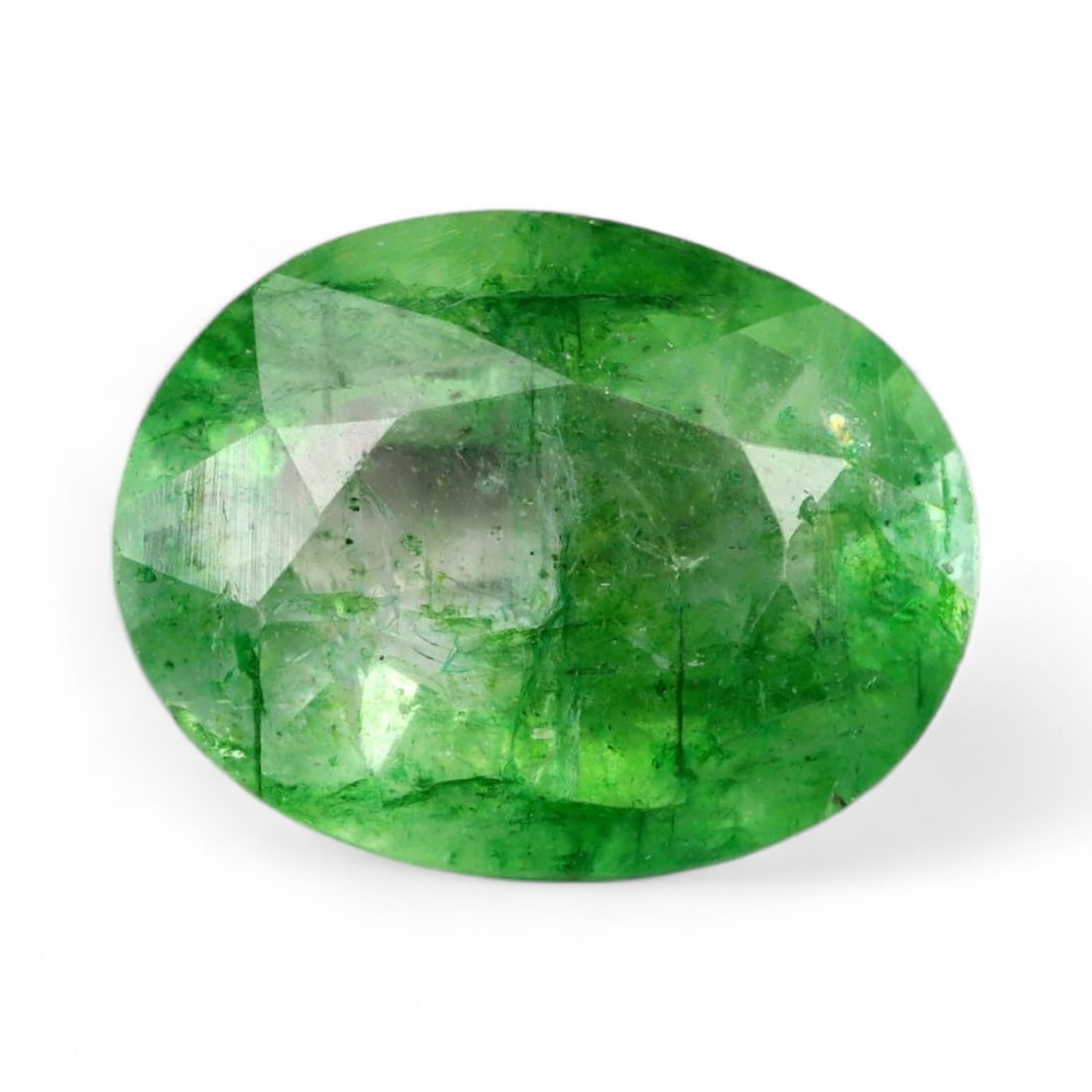 4.43 Carats Vivid Green Beryl - Natural Loose Gemstone: This vibrant green beryl exhibits a lush, saturated color reminiscent of spring foliage, with a lively translucence that glows from within. Its faceted surface enhances the stone's natural brilliance,
