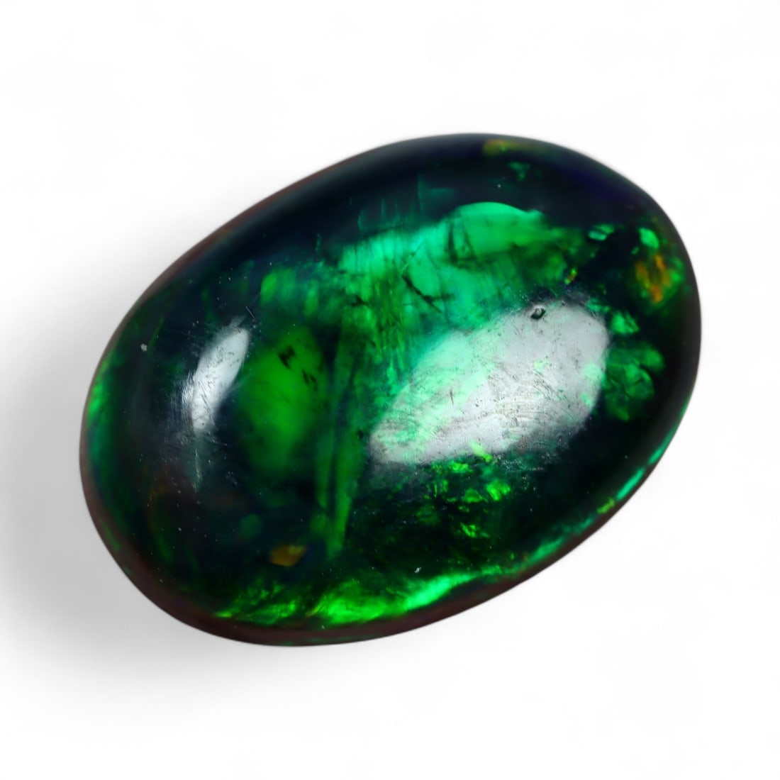 2.31 Carats Fiery Multicolor Black Opal - Natural Welo Stone: This captivating black opal dazzles with an intense play-of-color, igniting vivid flashes of crimson, electric green, and golden orange across a smoky, deep body tone. The contrast between its dark ba