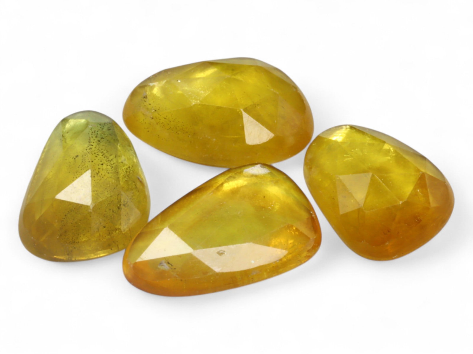 6.16 Carats Golden Yellow Sapphire Parcel - Natural African Stones: This warm and inviting parcel of rose cut sapphires glows with soft golden yellow tones, enhanced by a subtle translucency that lends each stone an appealing natural character. The rose cut faceting a