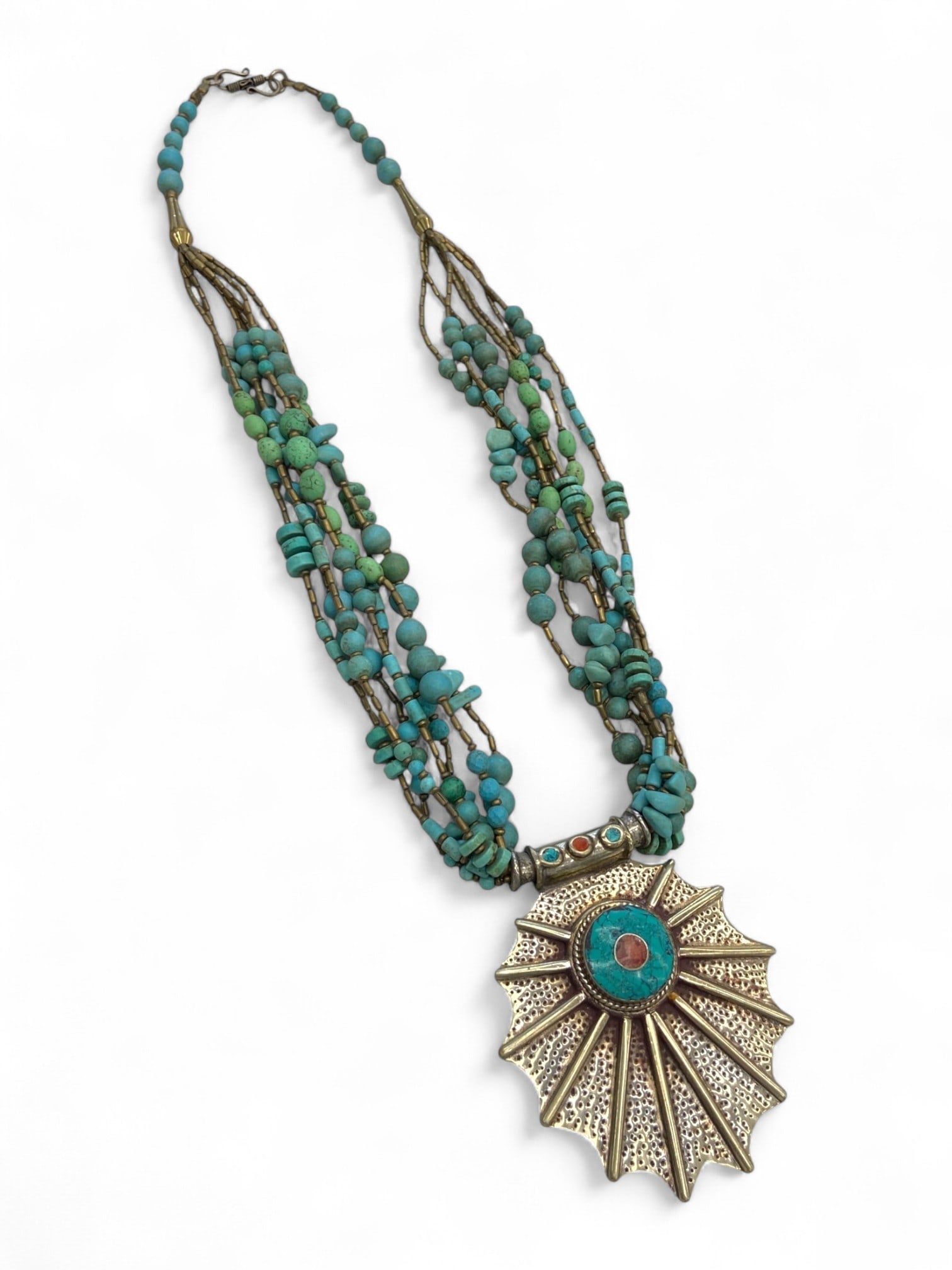 Vintage Himalayan Tribal Turquoise Coral Sunburst Pendant Necklace, mid-20th Century, 152g: This bold vintage Himalayan necklace, likely from Nepal or Tibet and dating to the mid-20th century, radiates cultural symbolism and artisanal mastery. Its commanding pendant is shaped in a dramatic s