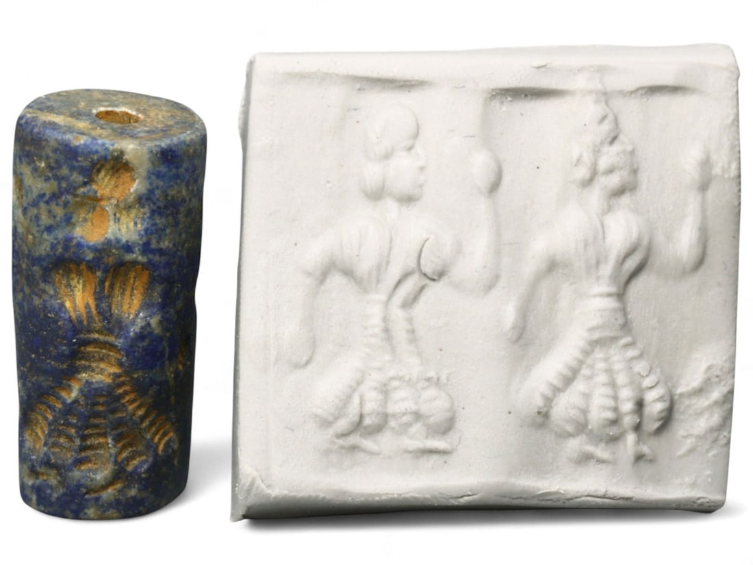 Ancient Akkadian Dancing Figures High-Relief Lapis Lazuli Cylinder Seal, c. 2350-2150 BCE, 12.24g: This rare and exquisitely carved lapis lazuli cylinder seal hails from the Akkadian Empire, dating to approximately 2350-2150 BCE. Characterized by its vibrant deep blue tone, it reflects both the gra