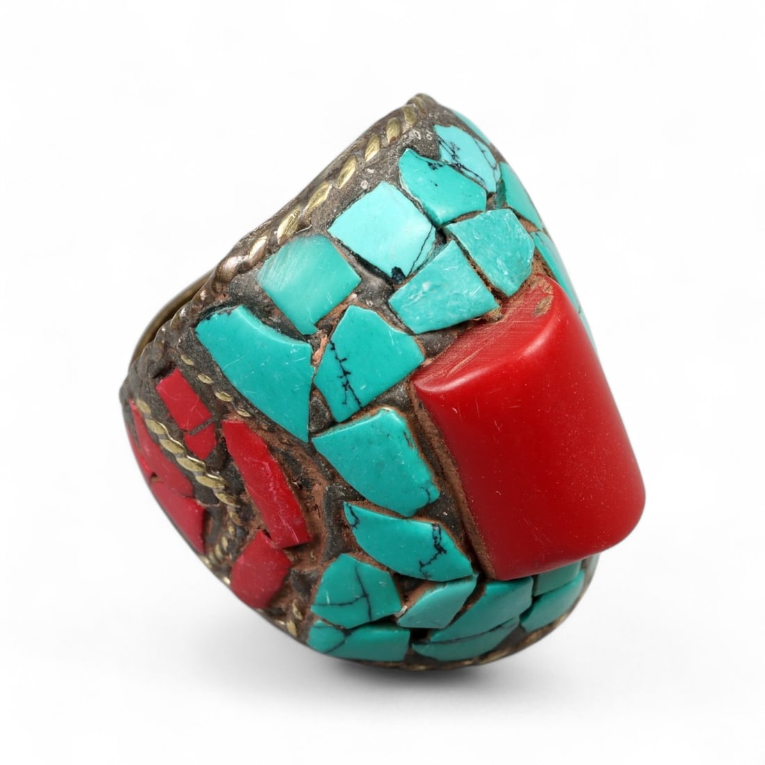 Antique Tibetan Tribal Red Cabochon Mosaic Turquoise Brass Ring, c. 20th Century, 9.4g: Vivid, elemental, and powerfully sculptural, this antique ring is a radiant expression of Tibetan tribal jewelry from the early-to-mid 20th century. Centered on a bold rectangular red cabochon-likely