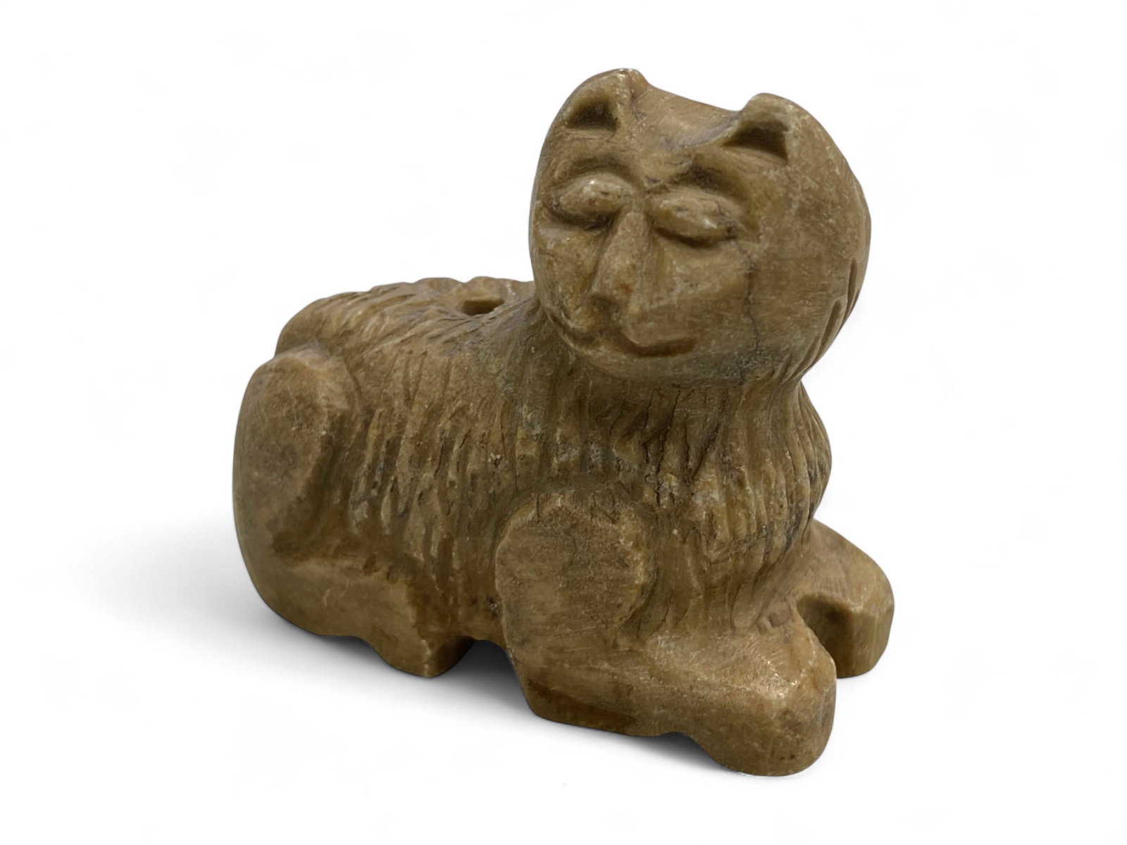 Ancient Mesopotamian Feline Guardian Steatite Effigy, c. 2nd-1st Millennium BCE, 88g: This charming steatite effigy of a seated feline, with closed eyes and a composed expression, likely originates from ancient Mesopotamia during the 2nd to 1st millennium BCE. Such animal figures were 
