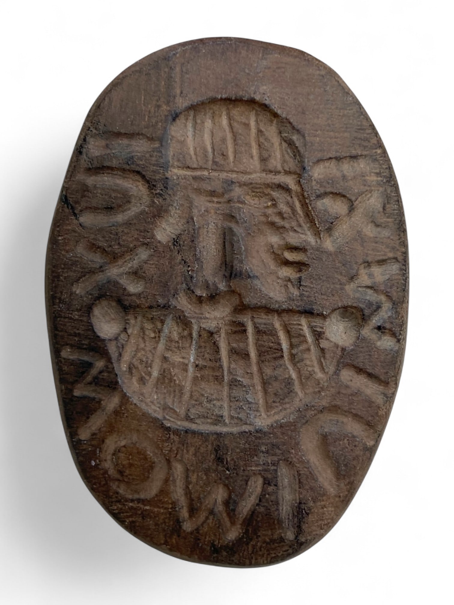 Ancient Parthian-Sasanian Bearded Warrior Intaglio Steatite Stamp, c. 1st-4th Century CE, 25g: This evocative stamp seal, engraved in dark steatite, features a bold portrait of a bearded warrior or royal figure wearing a crested helmet, surrounded by linear script in the Parthian or early Sasan