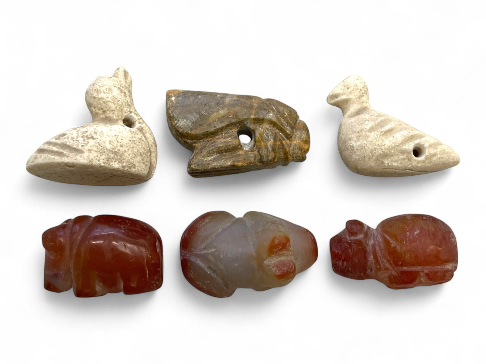 Ancient Coptic Egyptian Animal-Form Carnelian and Stone Amulets, c. 4th-7th Century CE, 53g: This beautifully preserved set of six miniature amulets from Coptic Egypt dates to the 4th-7th century CE, a transformative period that saw the rise of early Christian art infused with ancient Egyptia