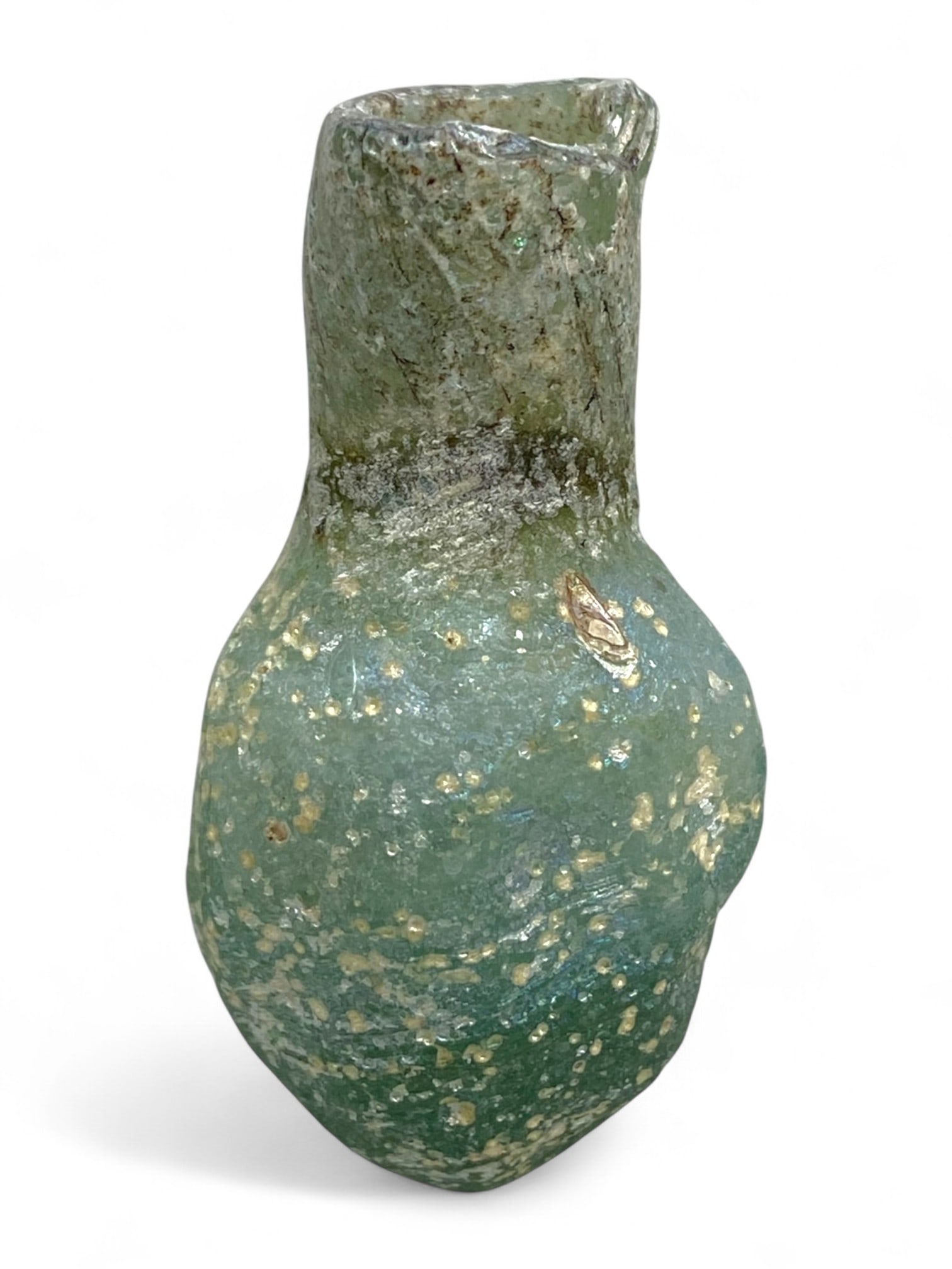 Ancient Roman Pale Green Glass Unguent Bottle, c. 2nd-3rd Century CE, 9g: A petite and beautifully weathered Roman glass bottle, likely used for perfumes or medicinal oils, dating to the 2nd-3rd century CE. This unguentarium measures 4 cm in height and 2 cm in width, with a