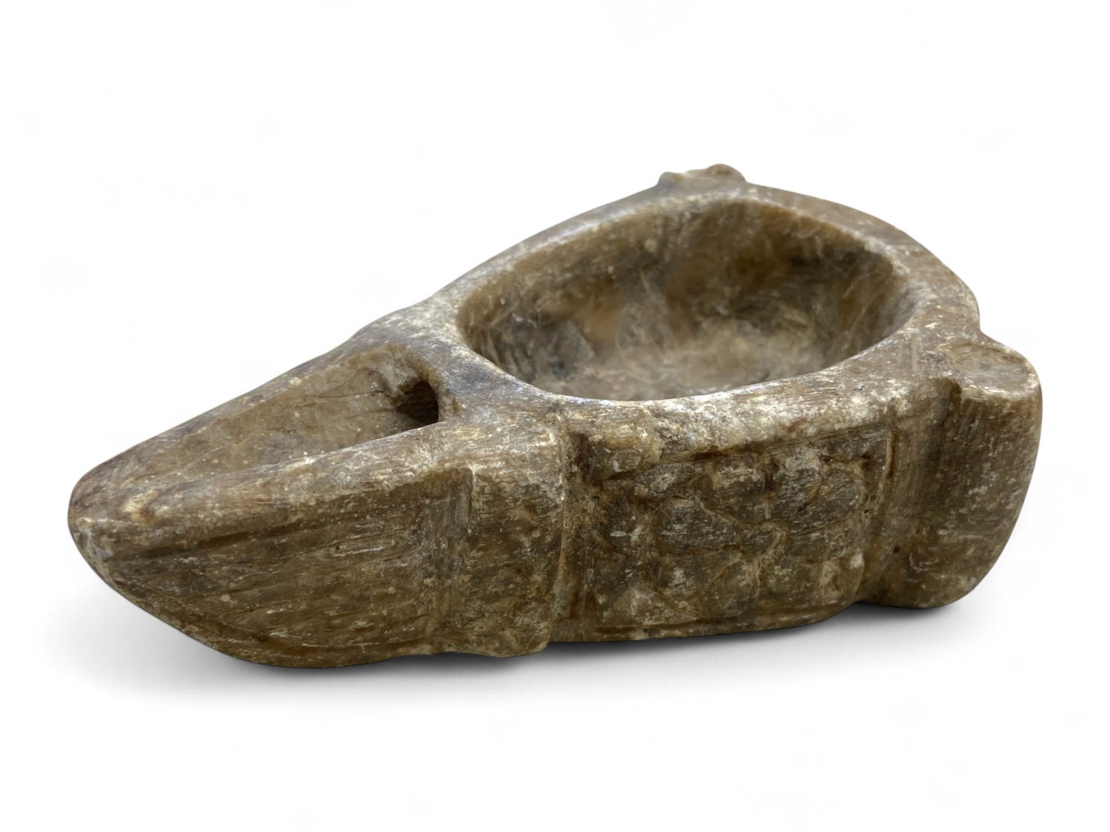 Ancient Near Eastern Carved Stone Oil Lamp with Floral Relief, c. 1st Millennium BCE, 338g: This finely carved stone oil lamp, measuring approximately 12 x 8 cm and weighing 338 grams, hails from the ancient Near East, dating to the 1st millennium BCE. Its form - compact, symmetrical, and fu