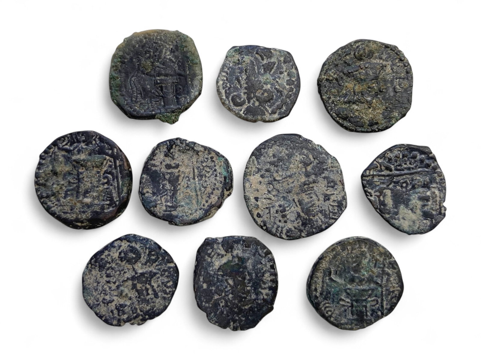 Ancient Sasanian Zoroastrian Bust Bronze Coin Collection (10 pcs), c. 5th-7th Century CE, 20g: This authentic collection of ten bronze coins hails from the powerful Sasanian Empire, which ruled Persia from 224 to 651 CE. Representing one of the last great pre-Islamic Persian dynasties, these co