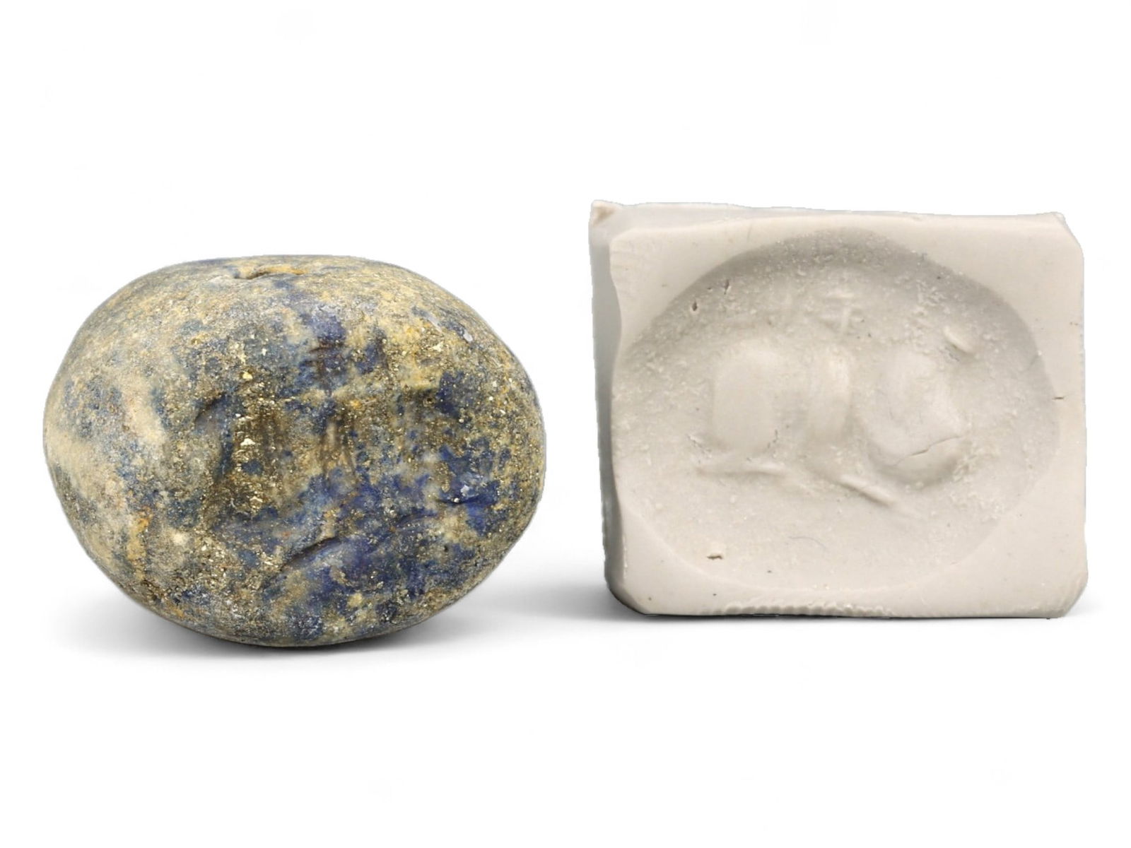 Ancient Elamite Reclining Ibex Symbolic Stamp Seal in Lapis Lazuli, c. 2500-1800 BCE, 13.7g: This substantial oval stamp seal, carved from shimmering lapis lazuli and dating to the Elamite period (c. 2500-1800 BCE), offers a powerful example of spiritual symbolism encoded in zoomorphic form.