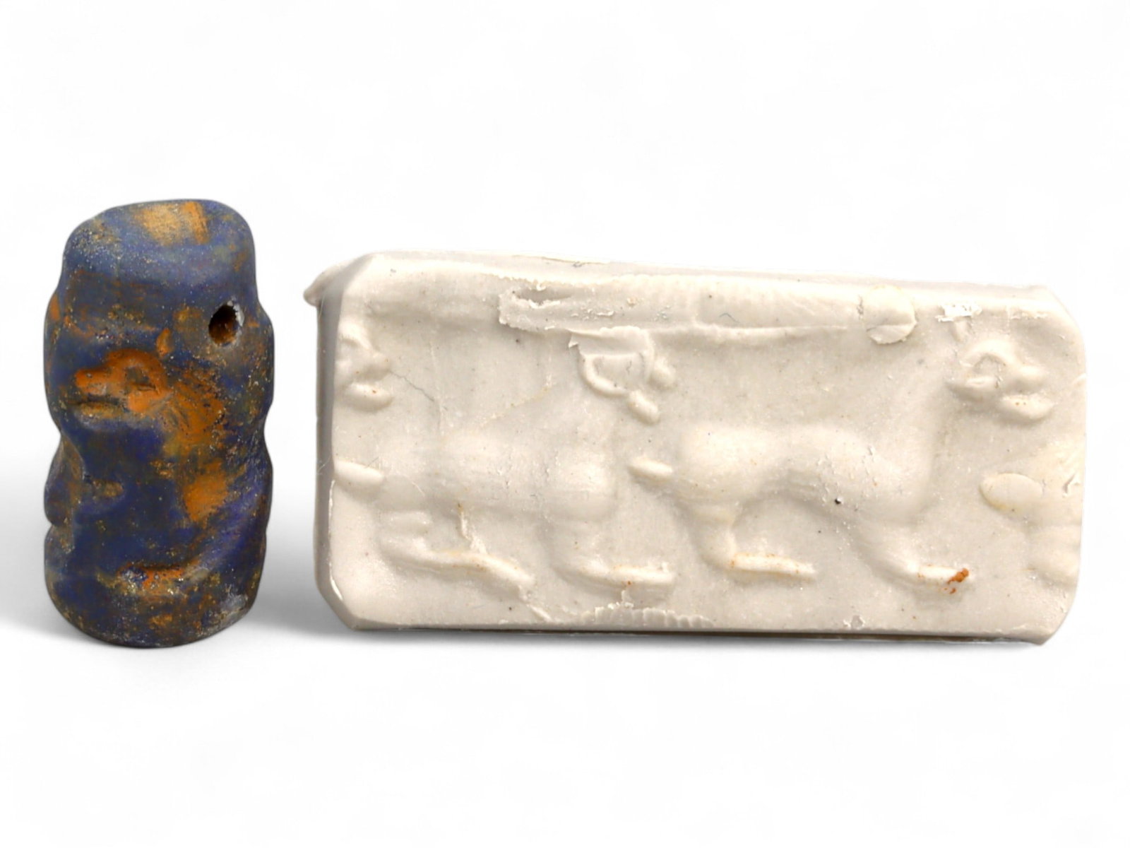 Ancient Akkadian High-Relief Cylinder Seal in Serpentine, c. 2350-2150 BCE, 3.4g: This exceptional cylinder seal, meticulously carved from dark green serpentine, is a quintessential example of Akkadian glyptic artistry from the mid-3rd millennium BCE. Measuring approximately 1.8 cm