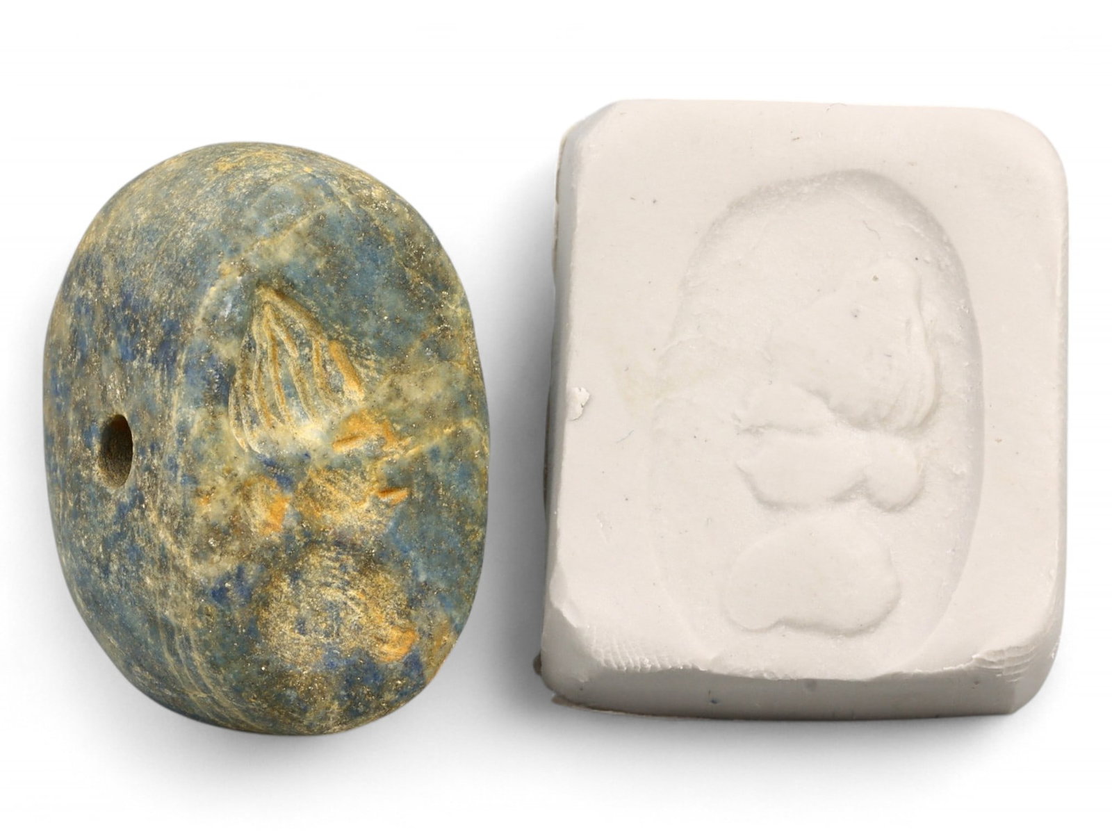 Ancient Elamite Noble Profile Portrait Lapis Lazuli Stamp Seal, c. 2500-1800 BCE - 25g: This weighty and sculpturally refined Elamite stamp seal, carved from rich lapis lazuli, presents the rare image of a human profile-likely a noble or priest-distinguished by a tall, fluted headdress a
