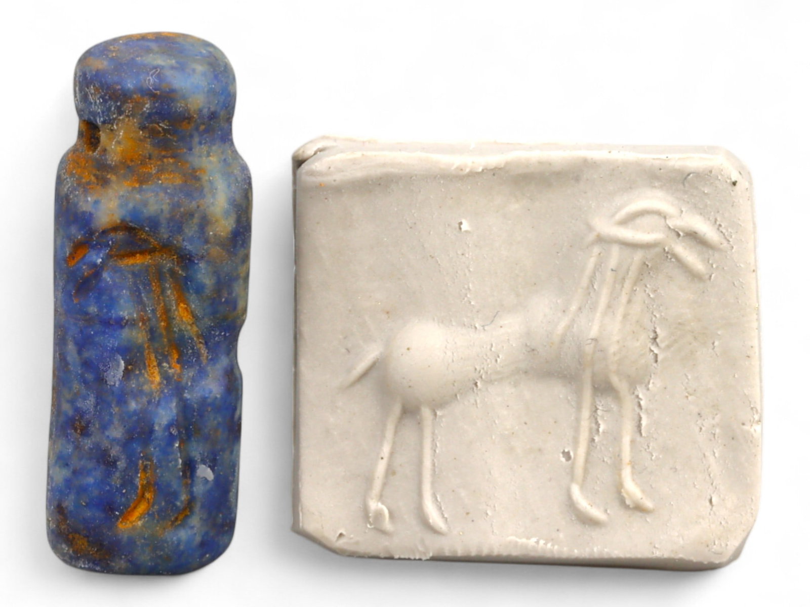 Ancient Elamite Long-Horned Ibex Lapis Lazuli Cylinder Seal, c. 2500-1800 BCE, 5.5g: This slender and graceful cylinder seal, carved from radiant lapis lazuli, dates to the Elamite period (c. 2500-1800 BCE) and showcases a striking depiction of a long-horned ibex-an enduring symbol of