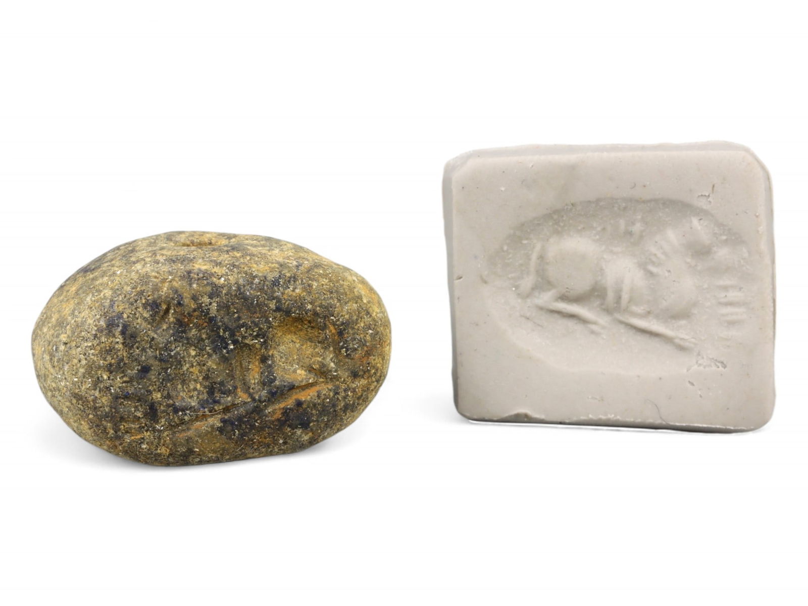 Ancient Akkadian Reclining Bull Lapis Lazuli Stamp Seal with Tri-Line Symbol, c. 2350-2150 BCE, 16g: This evocative lapis lazuli stamp seal from the Akkadian Empire, dating to approximately 2350-2150 BCE, captures the enduring image of a reclining bull, a central motif in Mesopotamian iconography. We