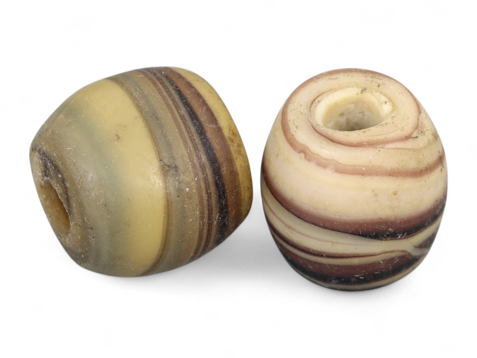 Ancient Persian Swirl Motif Glass Beads Pair, c. 5th-3rd Century BCE, 1.8cm, 18.4g: This exquisite matched pair of ancient Persian swirl glass beads dates to the Achaemenid period, circa 5th to 3rd century BCE-a time when the Persian Empire was at the height of its artistic and cultu