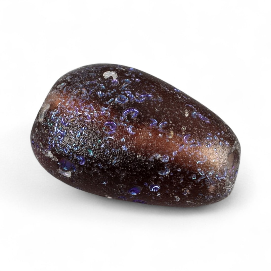 Ancient Roman Drop-Form Purple Glass Pendant Bead, c. 1st-3rd Century CE, 1.1g: Measuring 1.4 cm in height and weighing 1.1 grams, this exquisite drop-shaped pendant bead hails from the Roman Imperial era (c. 1st-3rd century CE), a period known for its flourishing glassmaking ind