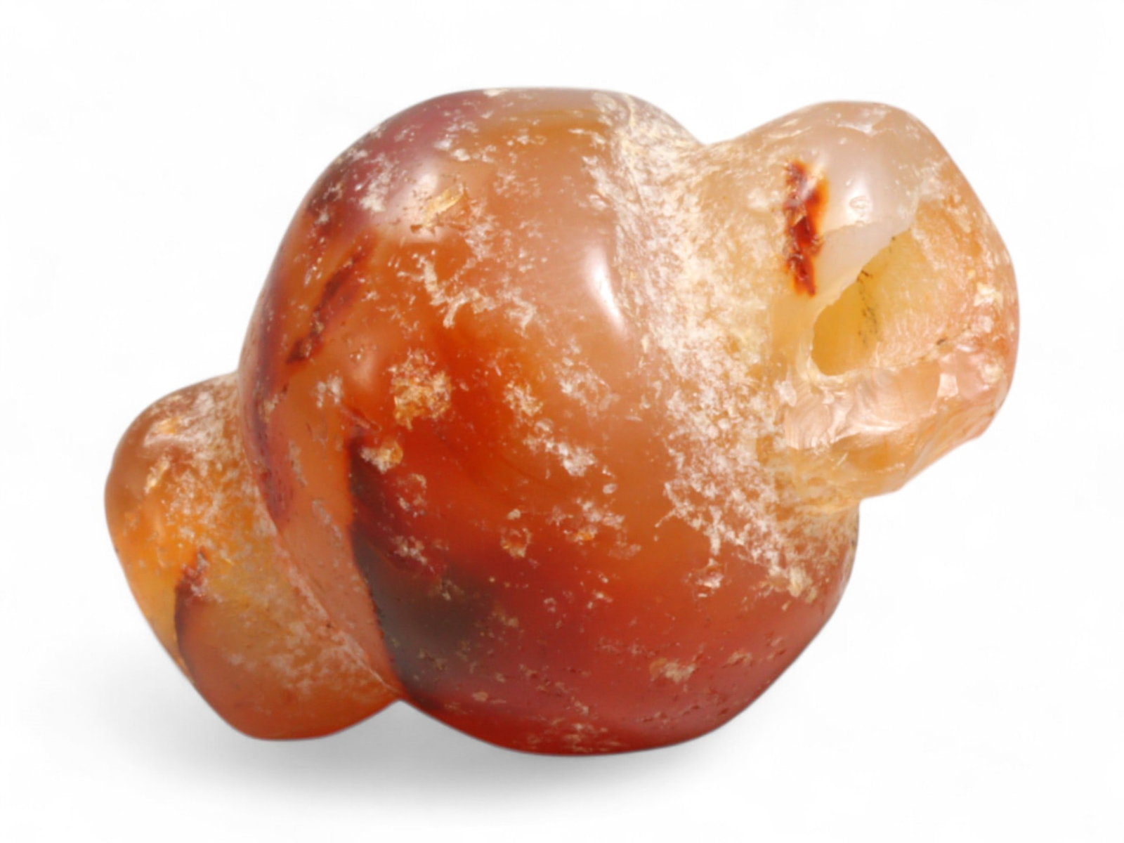 Ancient Medieval Chola Collared Carnelian Trade Bead, c. 9th-13th Century CE, 1.8cm, 4g: This finely polished carnelian bead, carved in a classic collared form, originates from the powerful Chola Dynasty of South India, a civilization that thrived between the 9th and 13th centuries CE. Th