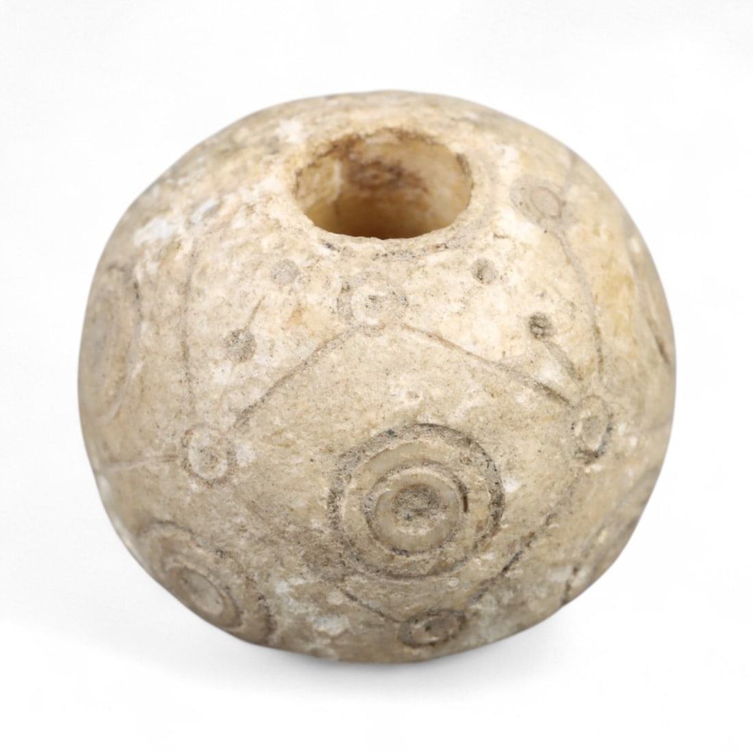 Ancient Indo-Greek Spiral Rosette Bone Spindle Whorl, c. 2nd-1st Century BCE, 1.3cm, 3g: Delicate yet enduring, this ivory-toned bone spindle whorl originates from the culturally rich Indo-Greek territories of Northern India or Afghanistan during the Hellenistic period, c. 2nd-1st century
