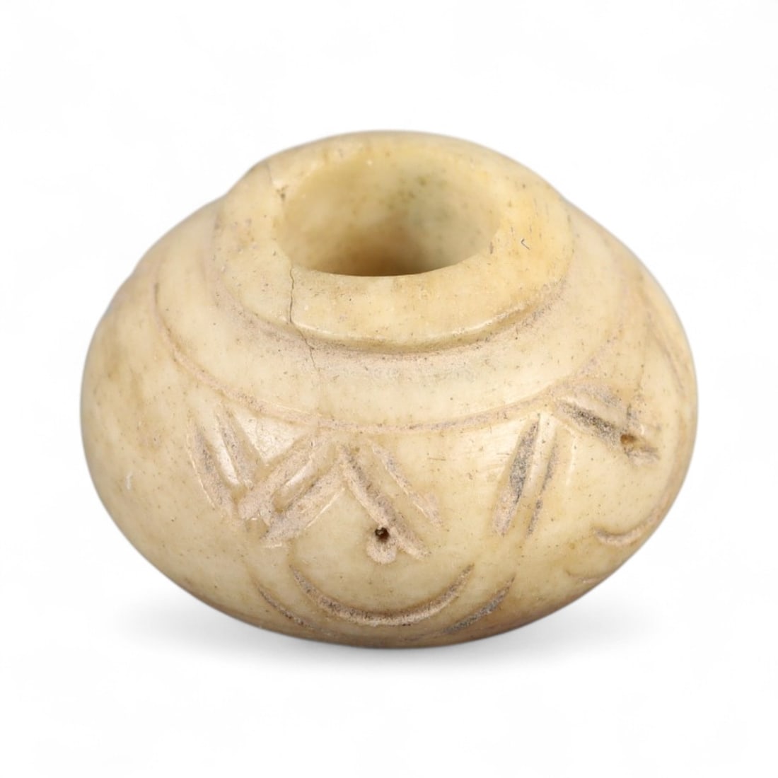 Ancient Indus Valley Geometric Lattice Pattern Bone Spindle Whorl, c. 2600-1900 BCE, 1.5cm, 1.78g: This exceptional spindle whorl, carved from creamy bone and adorned with finely incised geometric motifs, originates from the mature phase of the Indus Valley Civilization-one of the world's earliest 