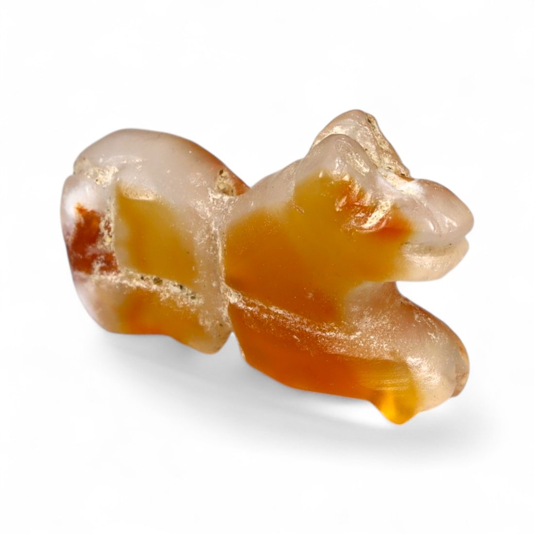 Ancient Medieval Near Eastern Zoomorphic Carnelian Amulet, c. 9th-12th Century CE, 2cm, 2.3g: This finely carved zoomorphic amulet, dating to the 9th-12th century CE, reflects the artistic ingenuity and symbolic depth of the Islamic Caliphate or broader Near Eastern world during the medieval p