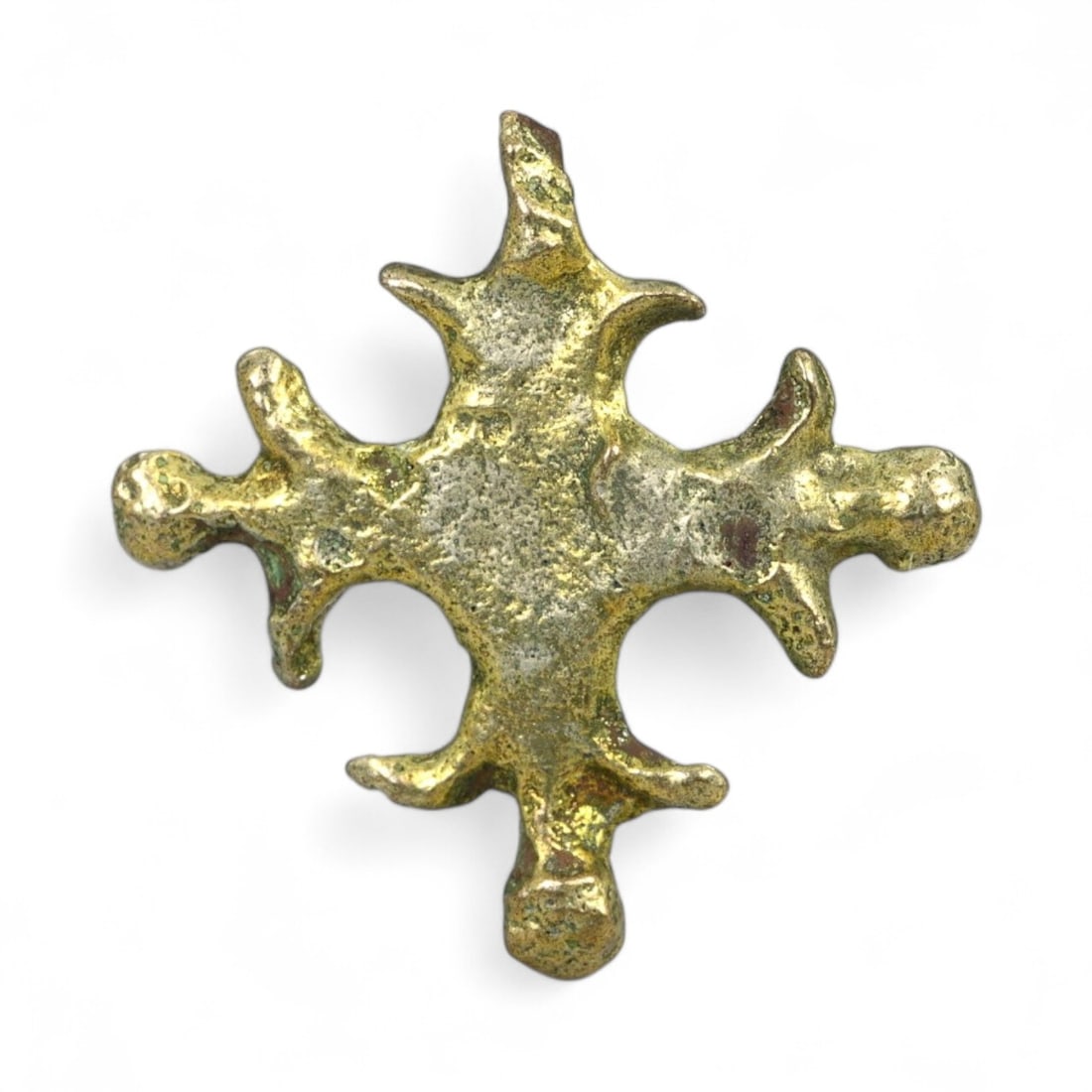 Ancient Slavic Gilt Branching Cross Bronze Amulet, c. 9th-11th Century CE, 0.5g: This miniature cross-form amulet, measuring 1.7 cm in diameter and weighing just 0.5 grams, embodies the spiritual crossroads of Early Medieval Eastern Europe. Crafted in bronze and once gilded with g