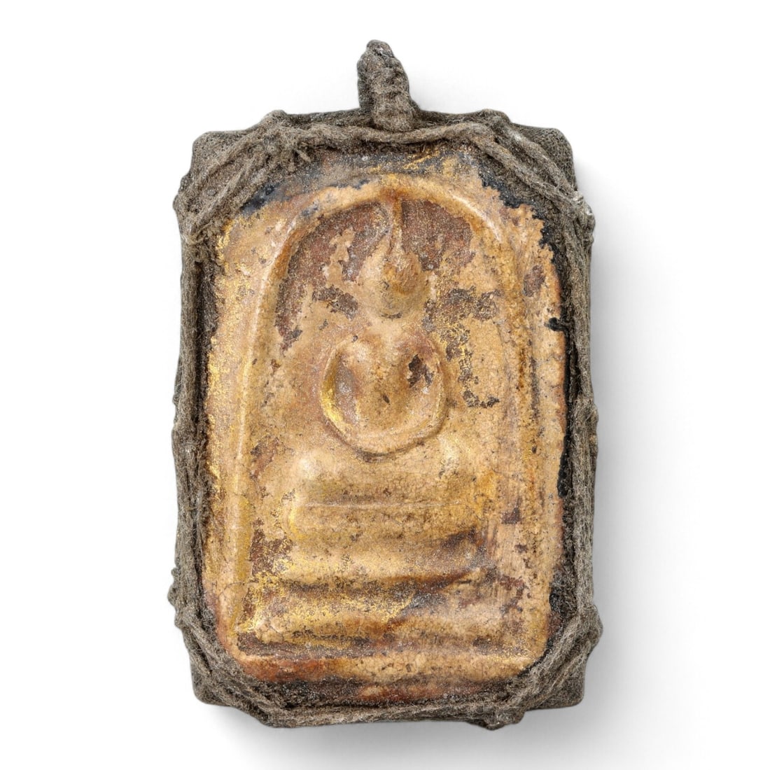 Antique Thai Phra Somdej Amulet in Original Cloth Wrap, c. Mid 19th Century, 32g: This antique Thai Phra Somdej amulet features the iconic meditating Buddha image in low relief, seated atop a three-tiered base beneath a domed arch. Cast in a sacred mixture of powdery clay, lime, an