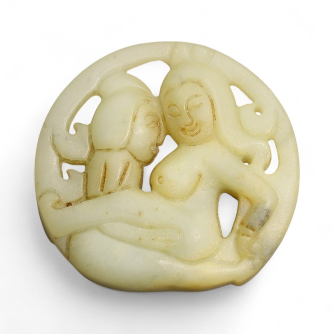 Antique Chinese Erotic Jade Plaque, Early 20th Century, 5.5x5cm, 49g: This intimate and rare round plaque carved from pale nephrite jade depicts a sensuous erotic scene of a couple in a tender embrace. Erotic jade carvings of this nature were privately commissioned by w