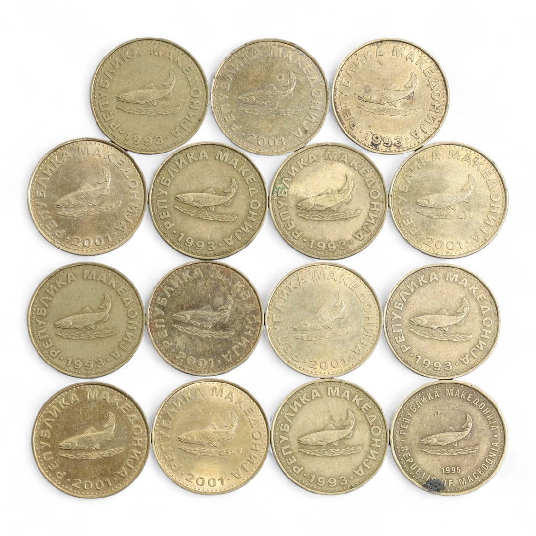 MACEDONIA: National Awakening - Ohrid Trout 2 Denari Coin Group, 1993-2001, 25mm: Struck during Macedonia's formative post-independence decade, this set of 16 brass 2 Denari coins embodies a young nation's effort to establish both economic stability and cultural identity. The obver