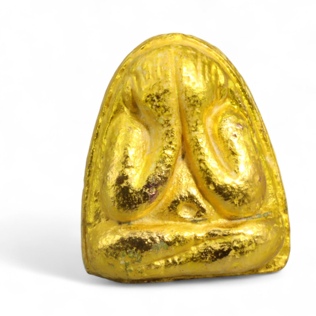 Thai Phra Pidta Gilded Meditation Amulet Seated Form, Modern Era, 30g: This luminous Thai Phra Pidta amulet, cast in a compact form and entirely gilded in radiant gold leaf, channels the timeless Buddhist principle of spiritual concealment. The figure, seated in full lot